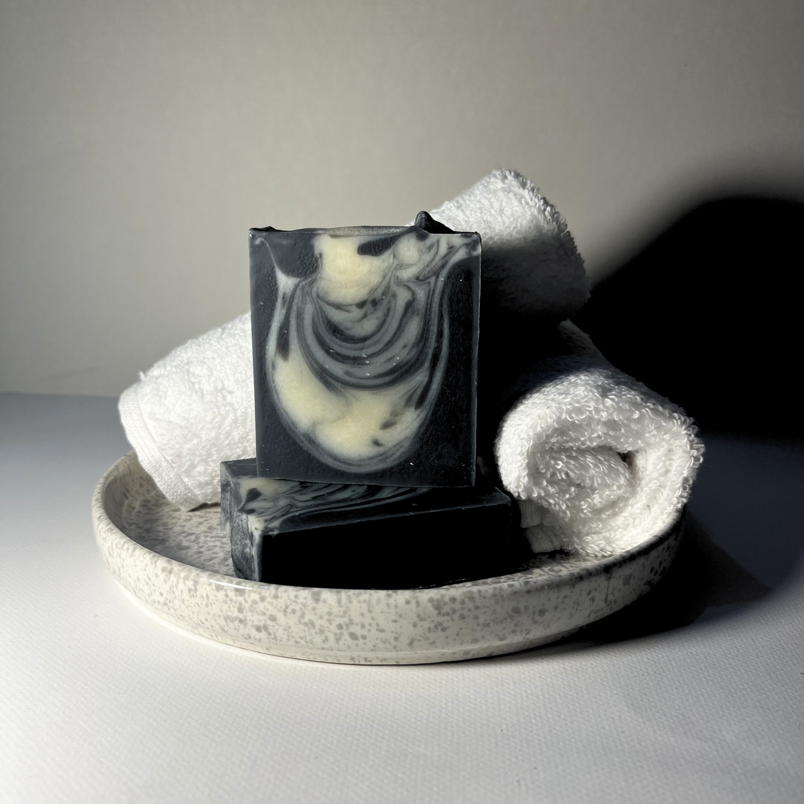 Activated charcoal handmade soap with tea tree, eucalyptus and swirl design