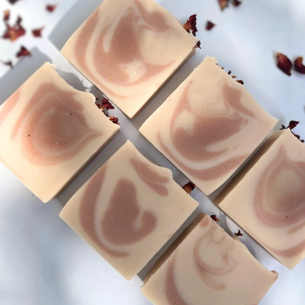 Botanical rose soap bars with pink clay swirls and dried rose petals